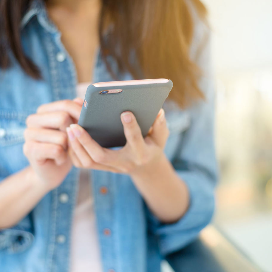 Person using handheld technology